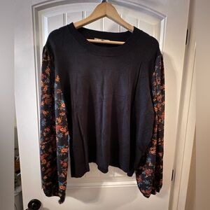 Daniel Rainn Black Top with Floral Accented Sleeves